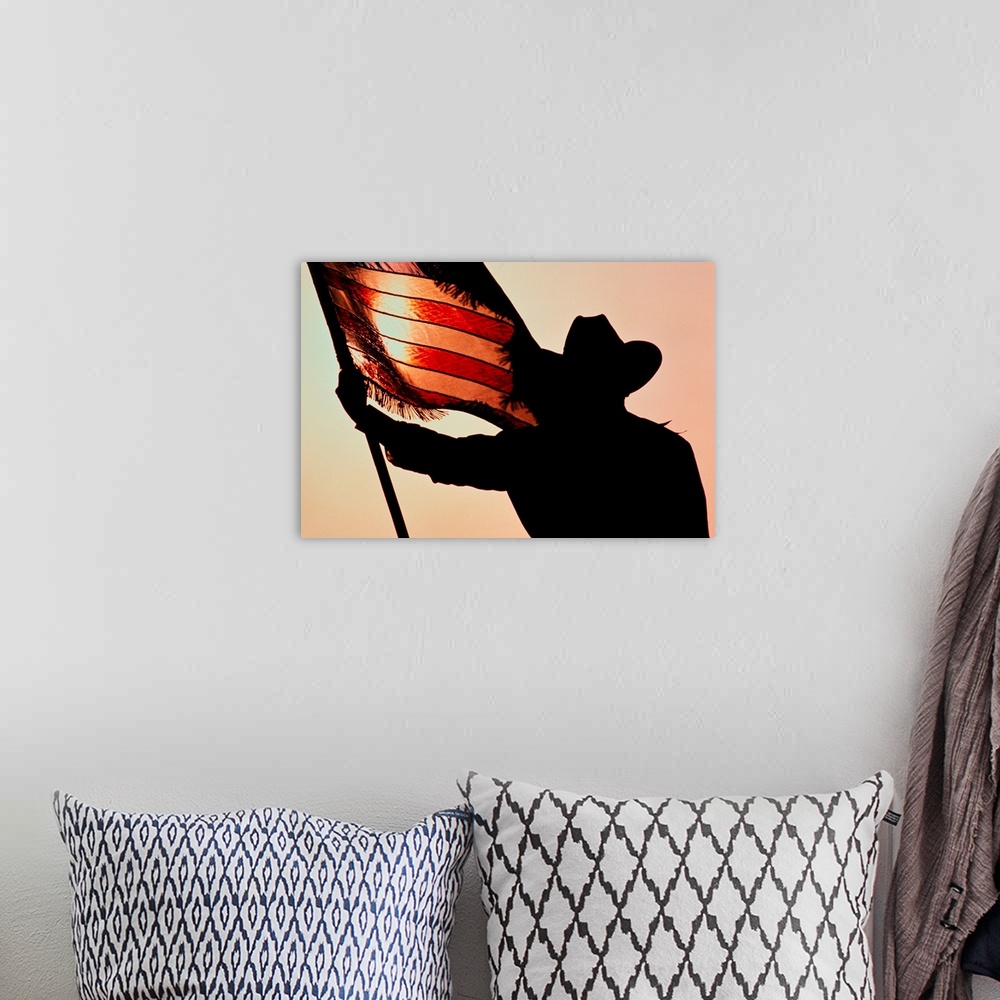 A bohemian room featuring Cowboy Holding Stars And Stripes, Silhouette, Texas, USA