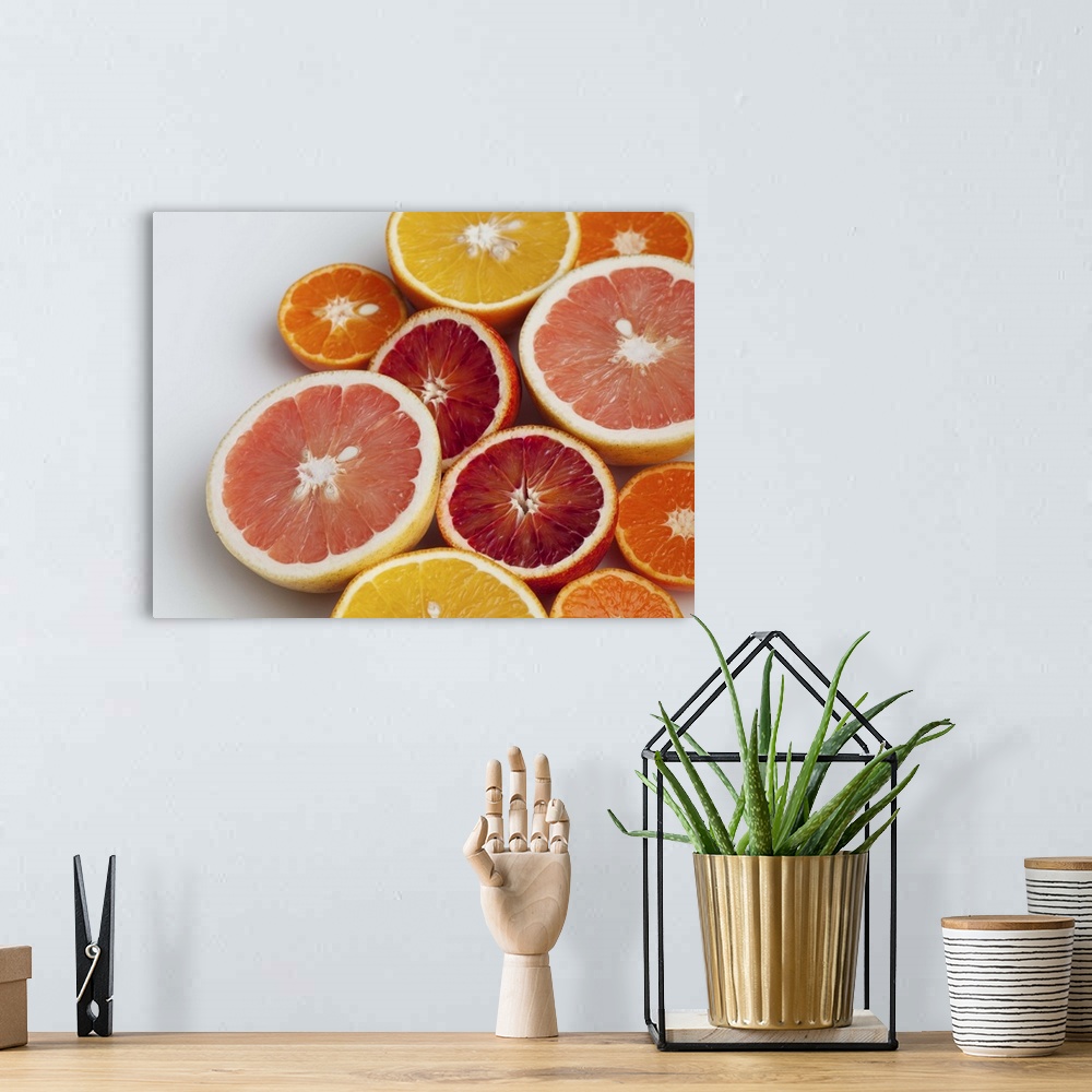 A bohemian room featuring Cut Oranges on table