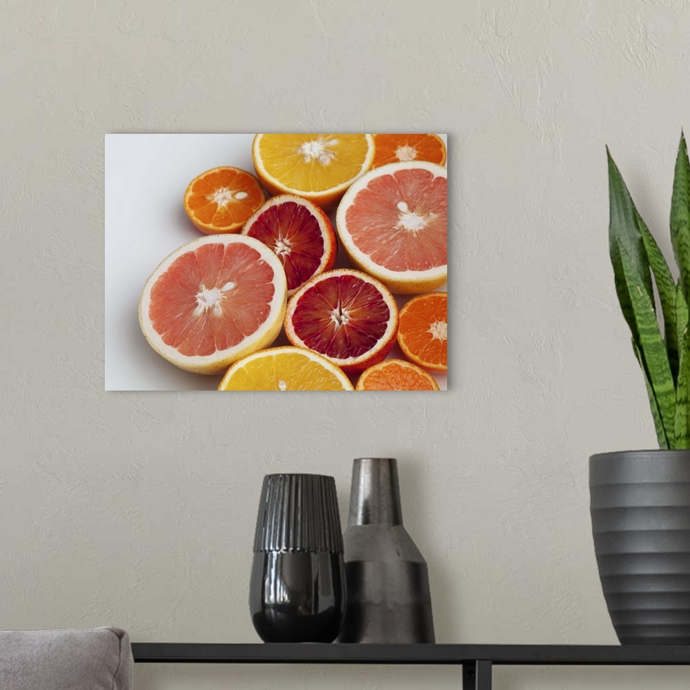 A modern room featuring Cut Oranges on table