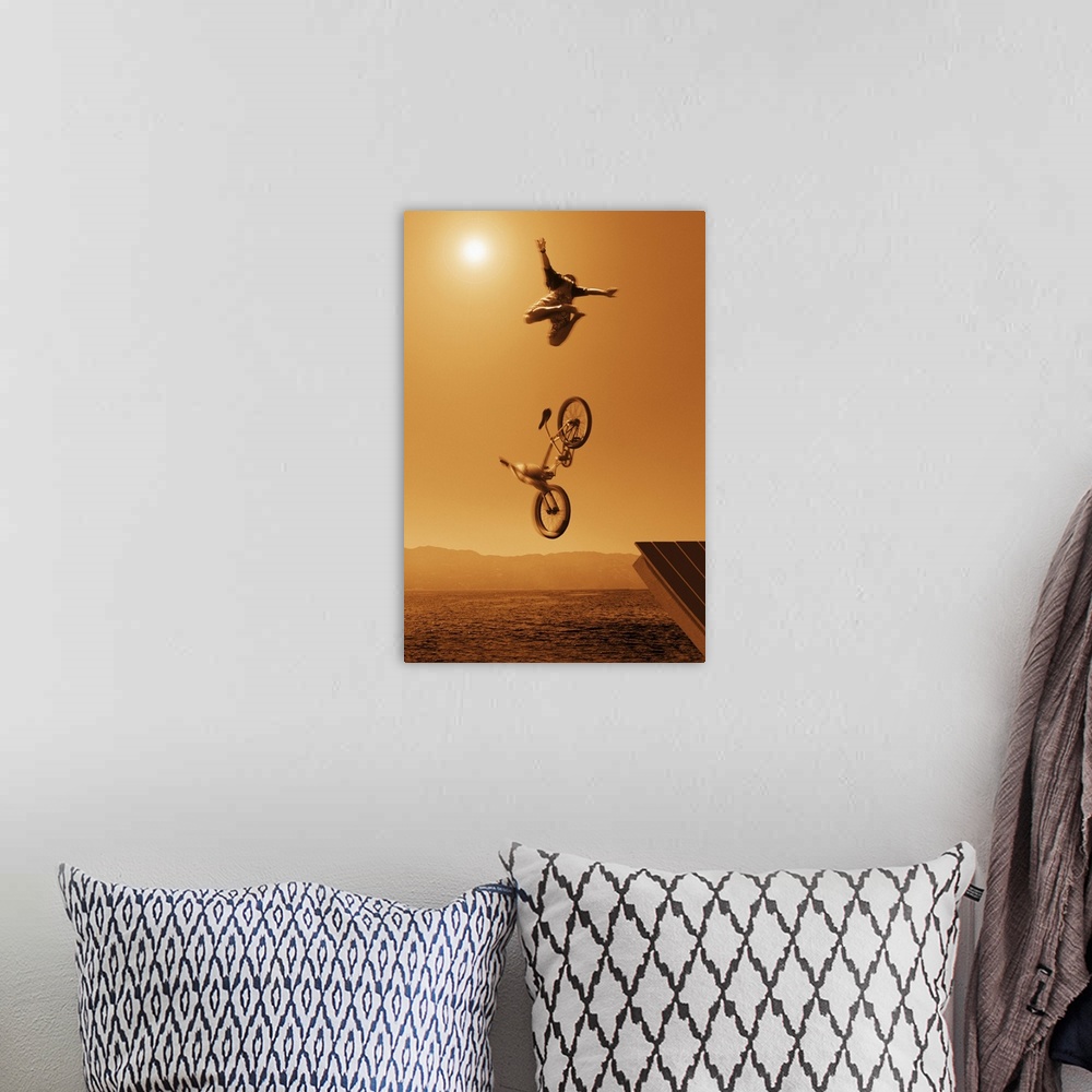 A bohemian room featuring Cyclist going off jump into water in brown tones