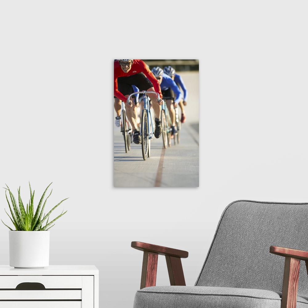 A modern room featuring Cyclists racing