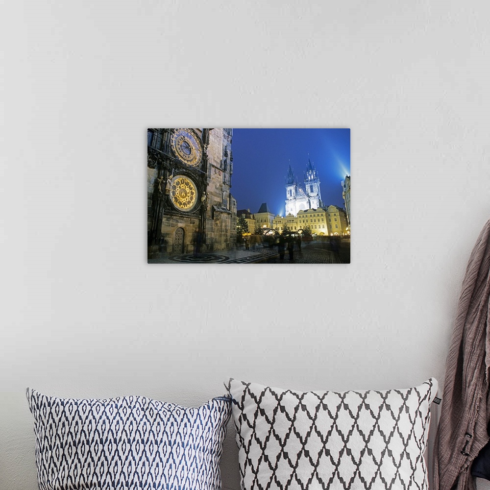 A bohemian room featuring Czech Republic, Prague, Old town square and church of Our Lady and Town Hall Horologe at night