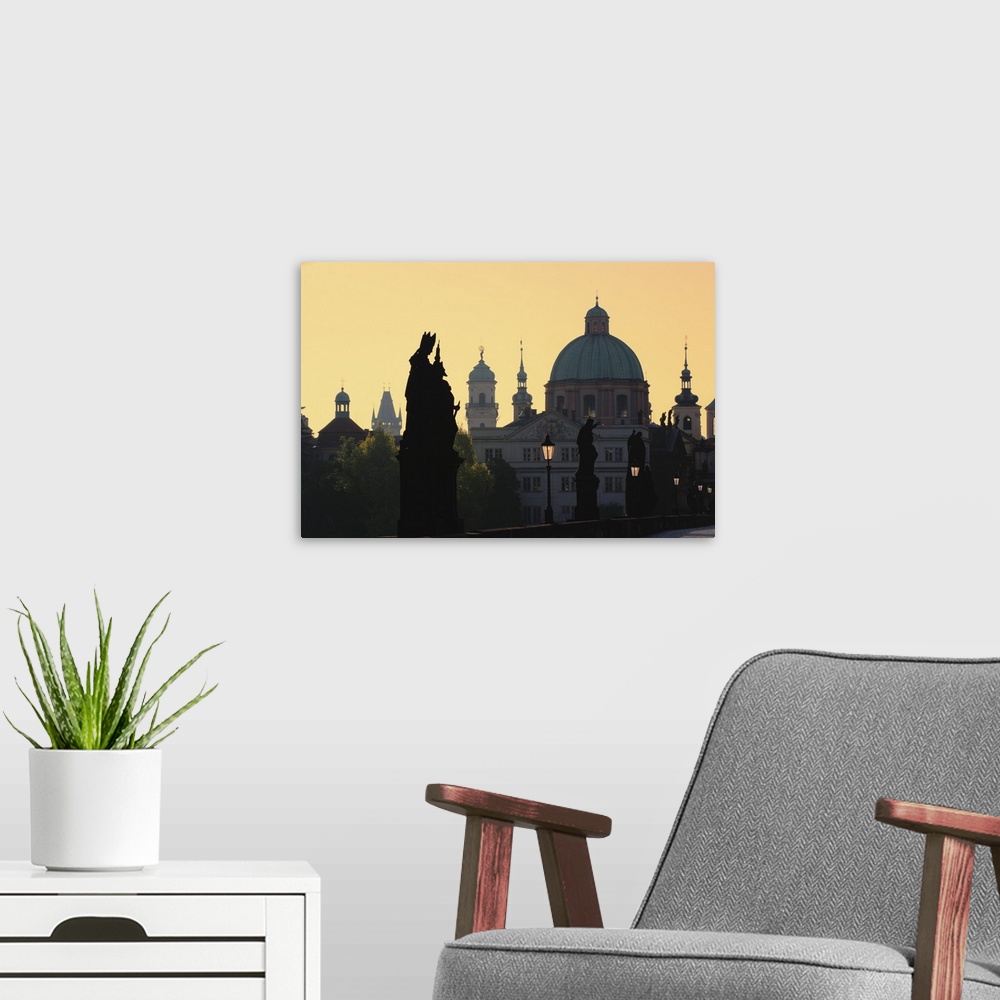 A modern room featuring Czech Republic, Prague, Old Town, view from Charles Bridge, sunrise