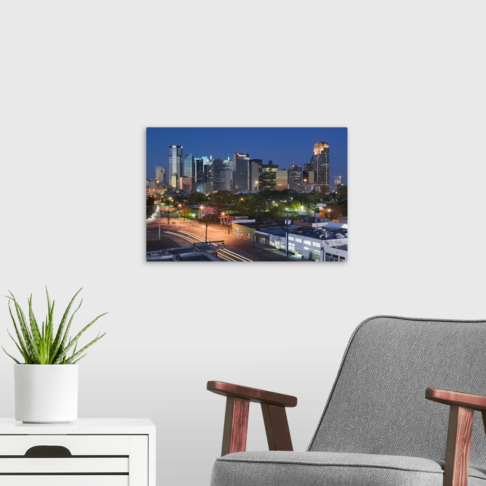 A modern room featuring Dallas, Texas, skyline at dawn