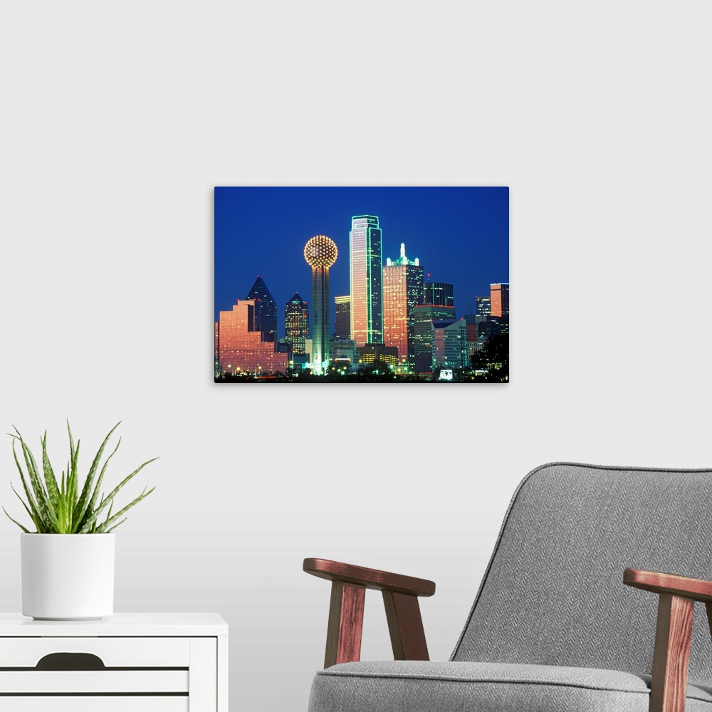 A modern room featuring 'Dallas, TX skyline at night with Reunion Tower'