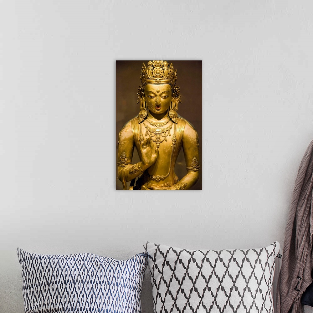 A bohemian room featuring A bronze casting of a bodhisattva by Zanabazar (1635-1723), the first Jebtsundamba Khutuktu, the ...