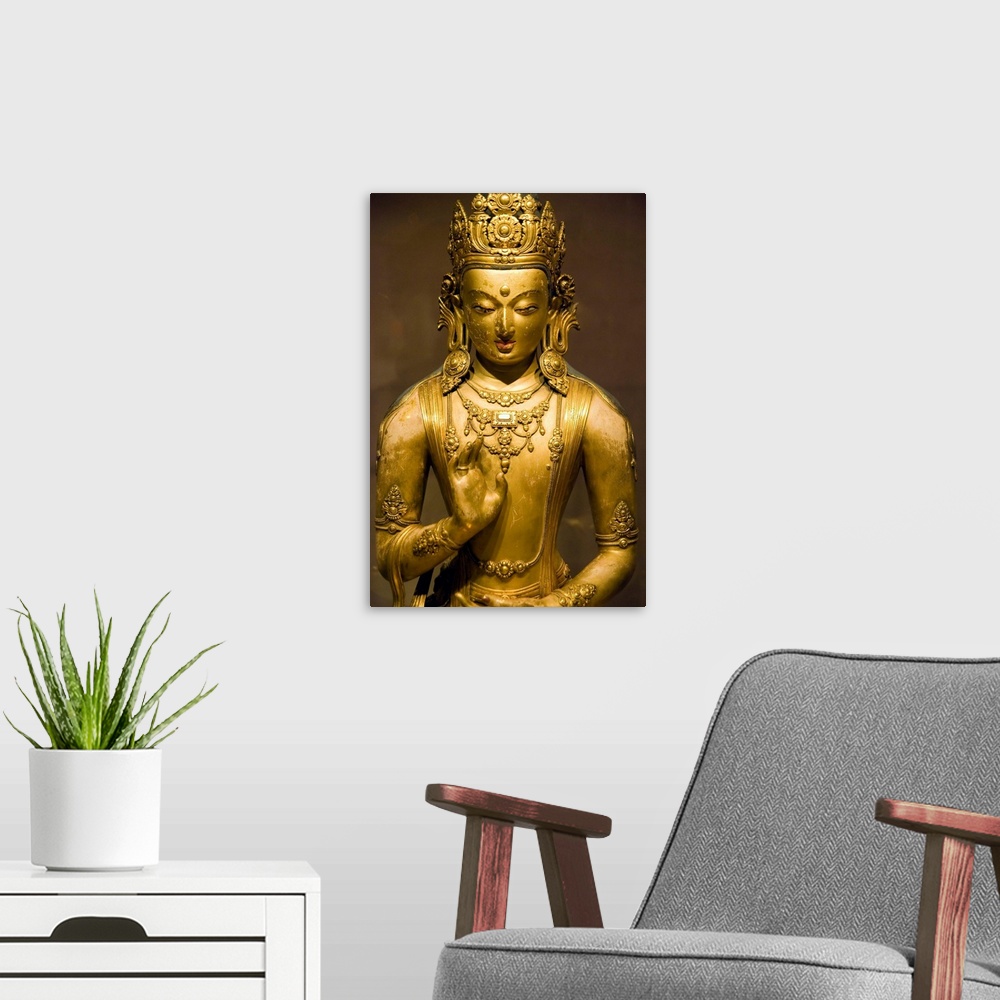 A modern room featuring A bronze casting of a bodhisattva by Zanabazar (1635-1723), the first Jebtsundamba Khutuktu, the ...