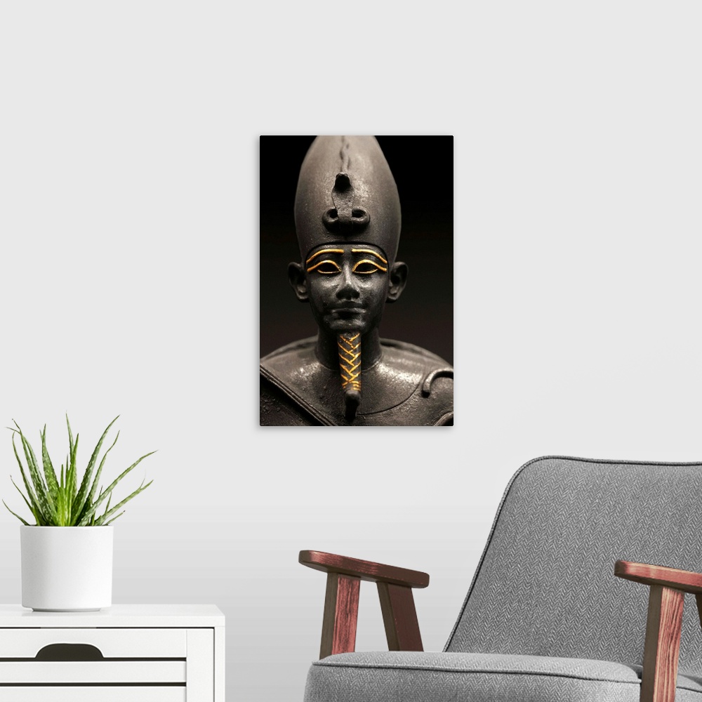 A modern room featuring Detail Of Statuette Of Osiris Sitting