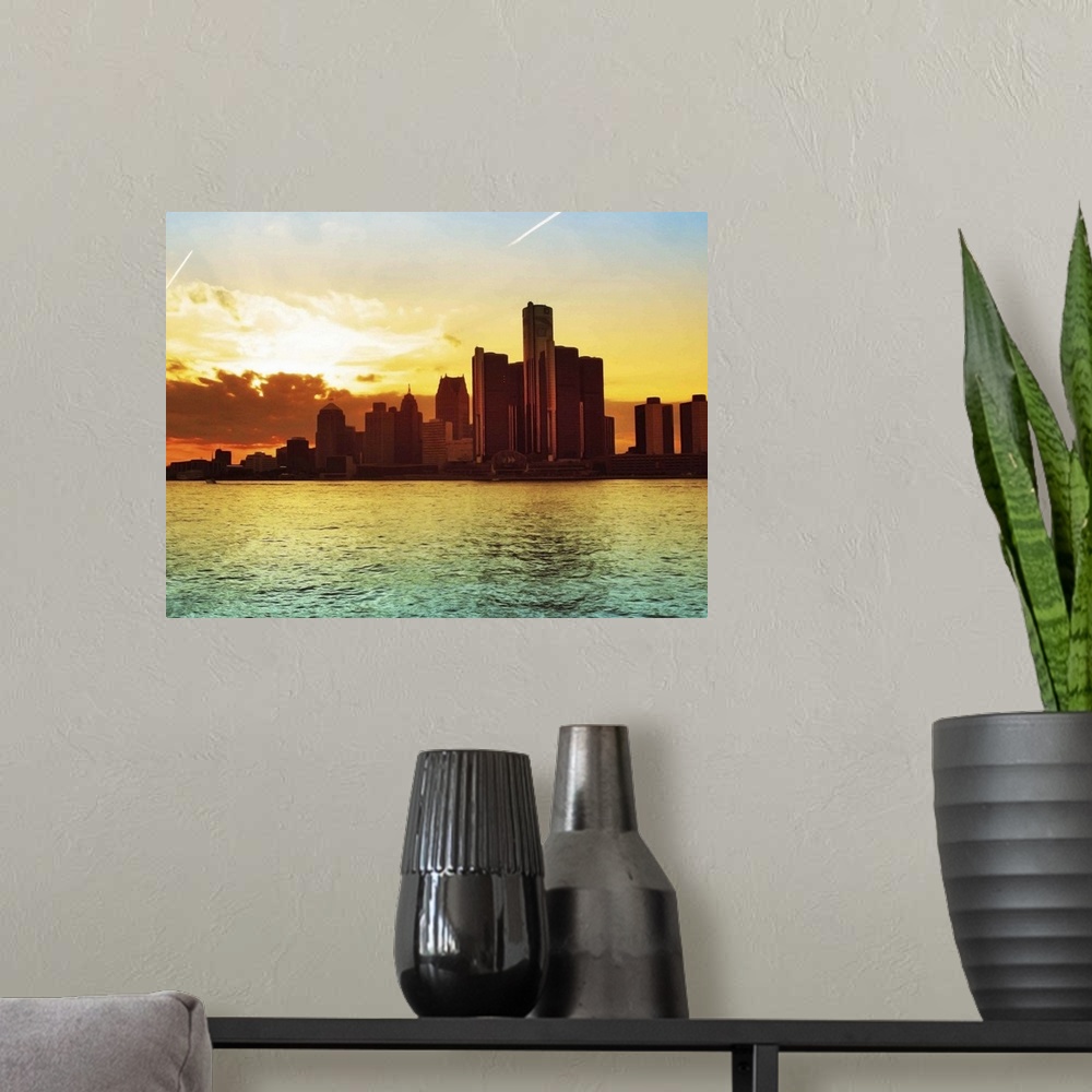 A modern room featuring Sunset on the Detroit River.