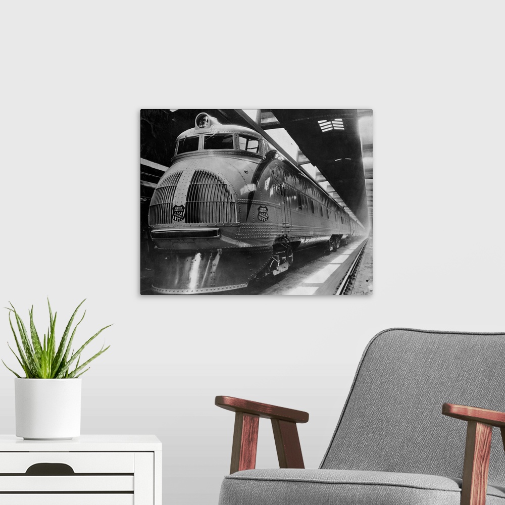 A modern room featuring A Union Pacific 11-car diesel electric train is equipped with a 2100 HP engine and General Electr...