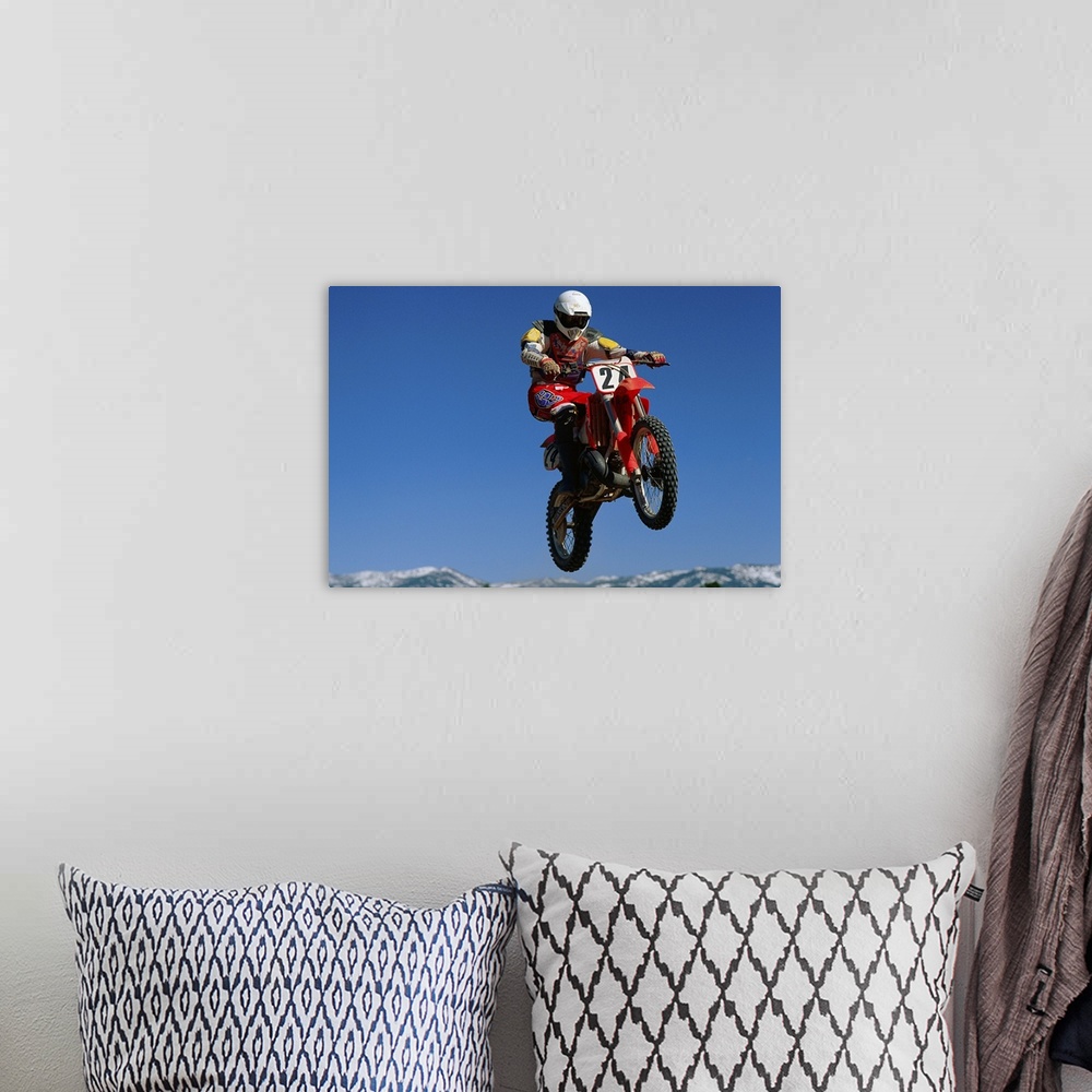 A bohemian room featuring Dirt biker in mid-air
