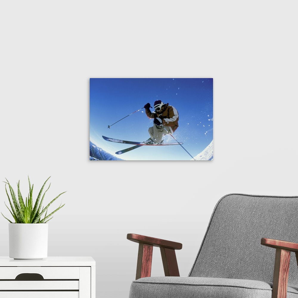 A modern room featuring Downhill skier in mid-air