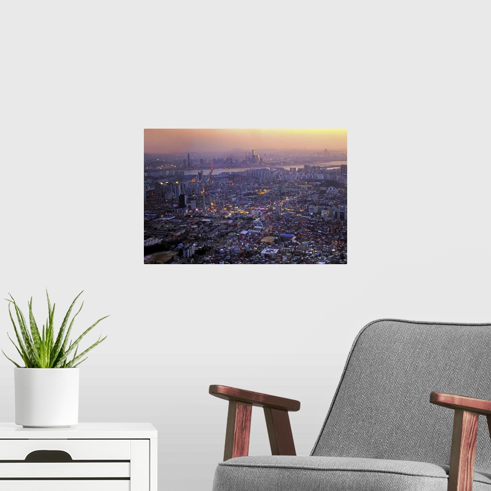 A modern room featuring Downtown of Seoul at sunset in South Korea.