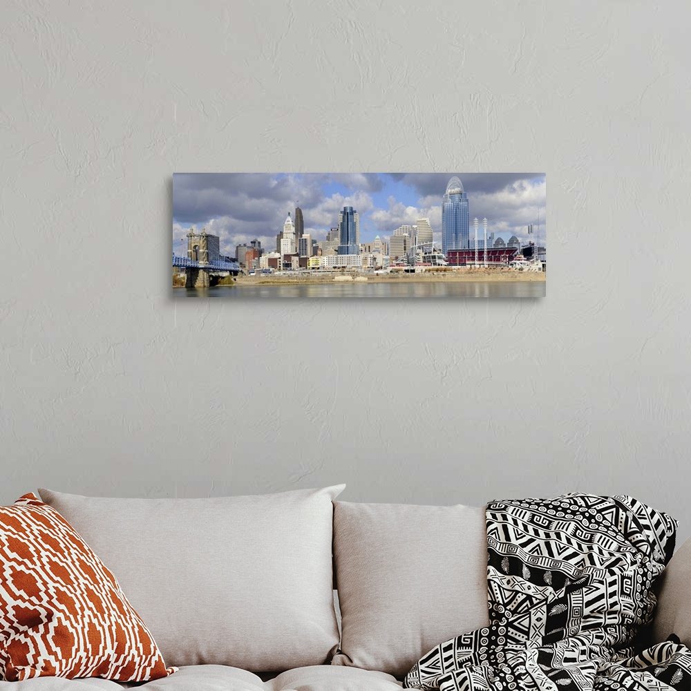 A bohemian room featuring Downtown skyline of Cincinnati as view across the Ohio River.