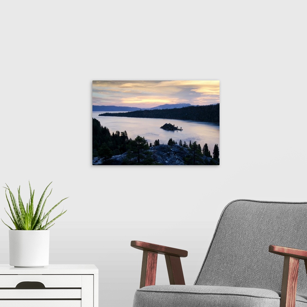 A modern room featuring Dramatic clouds at sunset over Emerald Bay in Lake Tahoe, CA.