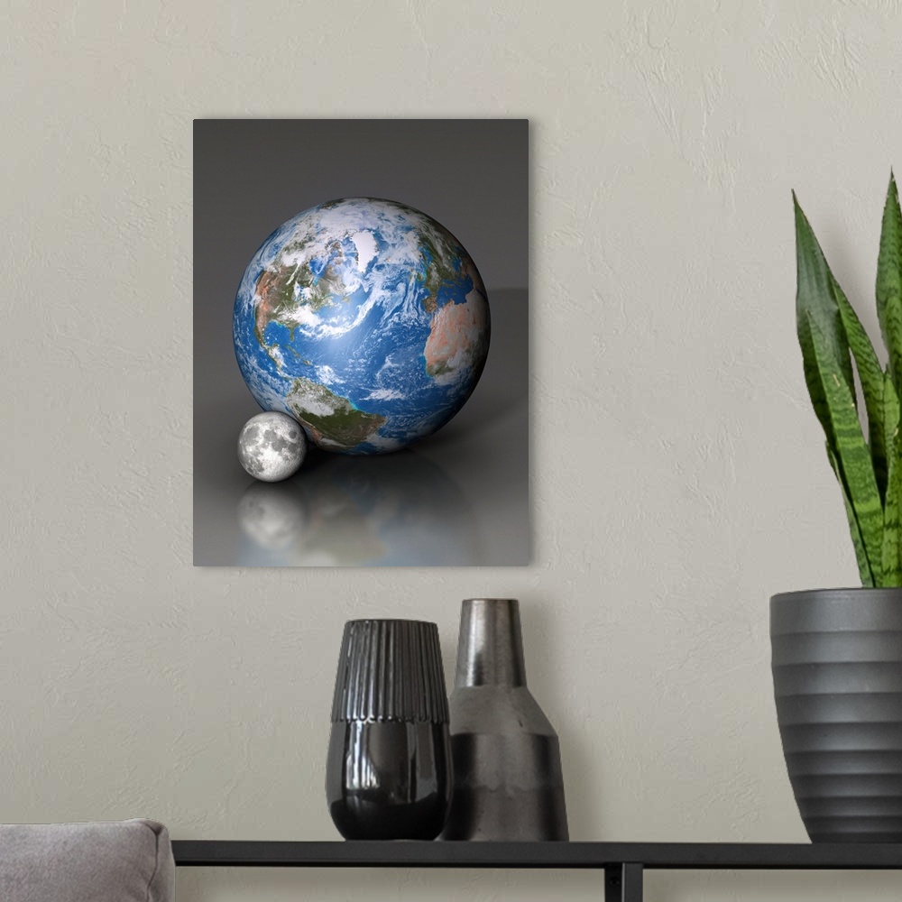 A modern room featuring Earth alongside the Moon showing the difference in scale. The Moon is only 27% larger than Earth.