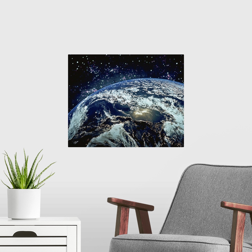 A modern room featuring Earth from Space