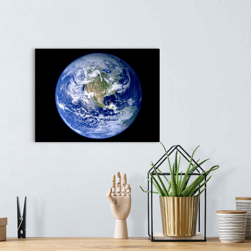 A bohemian room featuring Earth with North America prominent
