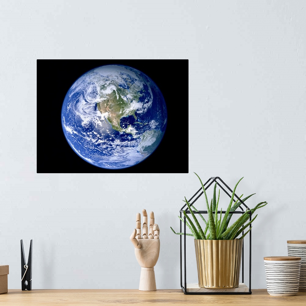 A bohemian room featuring Earth with North America prominent
