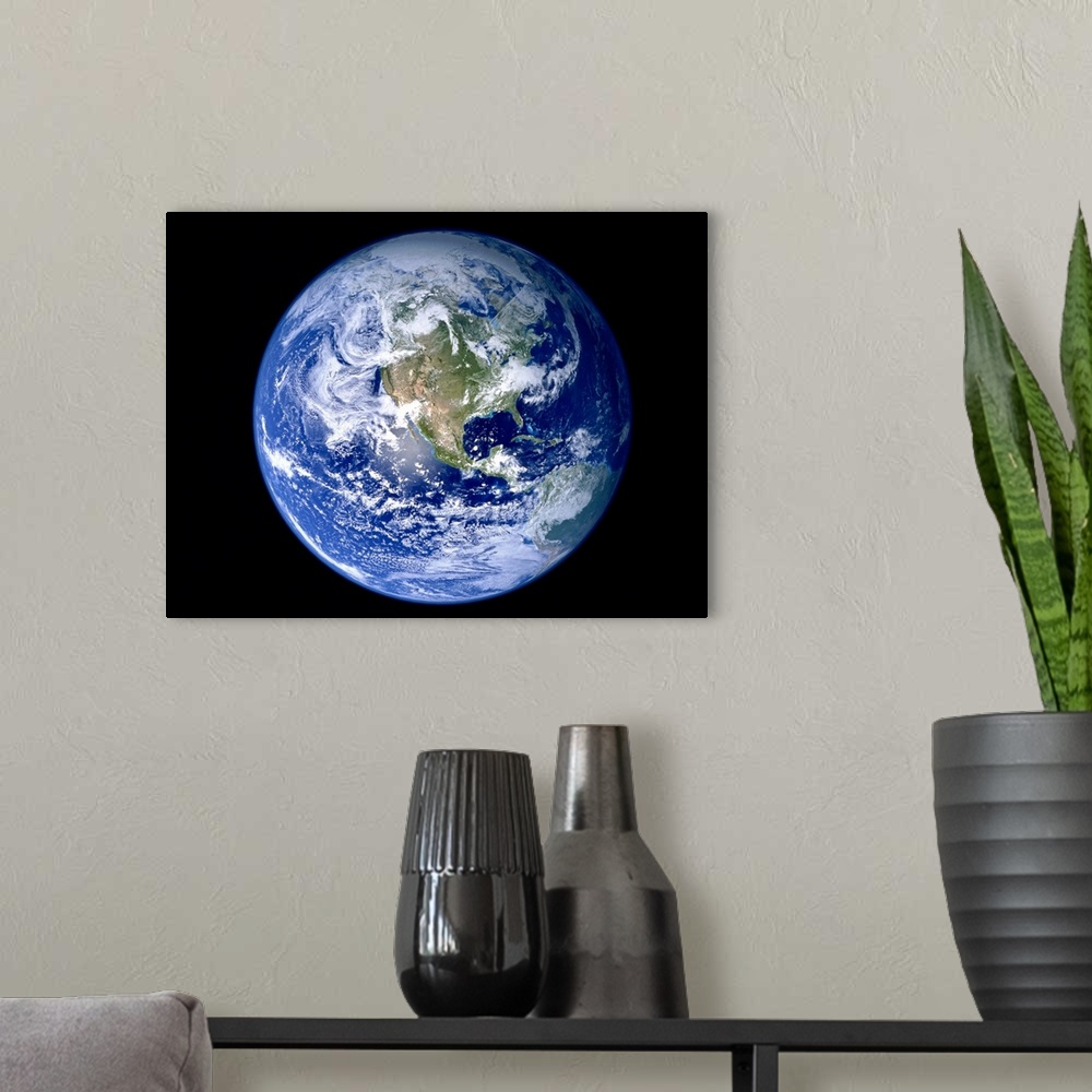 A modern room featuring Earth with North America prominent
