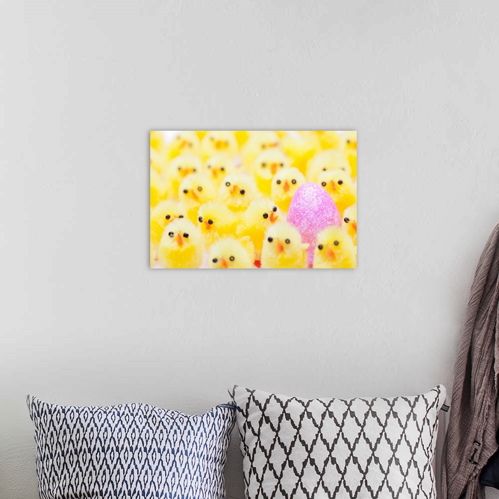 A bohemian room featuring An Easter egg in a crowd of yellow chicks