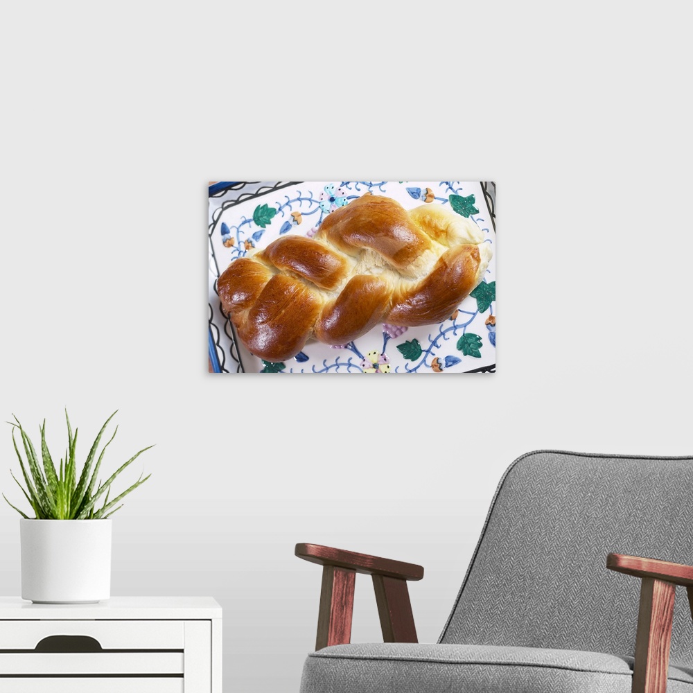 A modern room featuring Egg bread on challah plate
