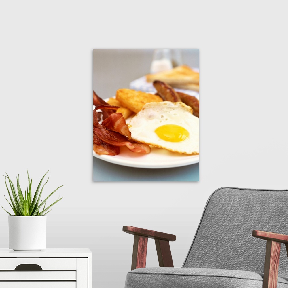 A modern room featuring Eggs, bacon, hashbrown and sausage