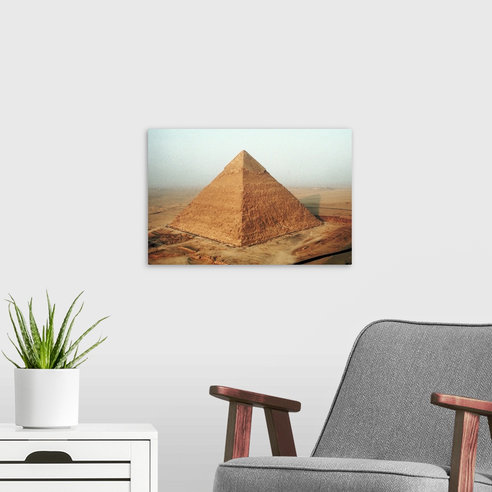 A modern room featuring Egyptian pyramid