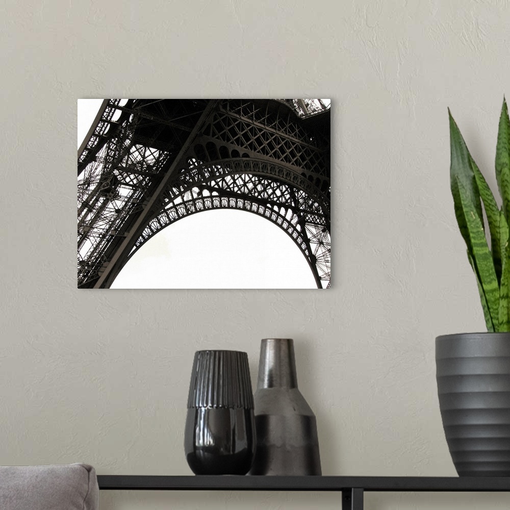 A modern room featuring Up-close photograph of architectural detail of iconic monument in Paris.