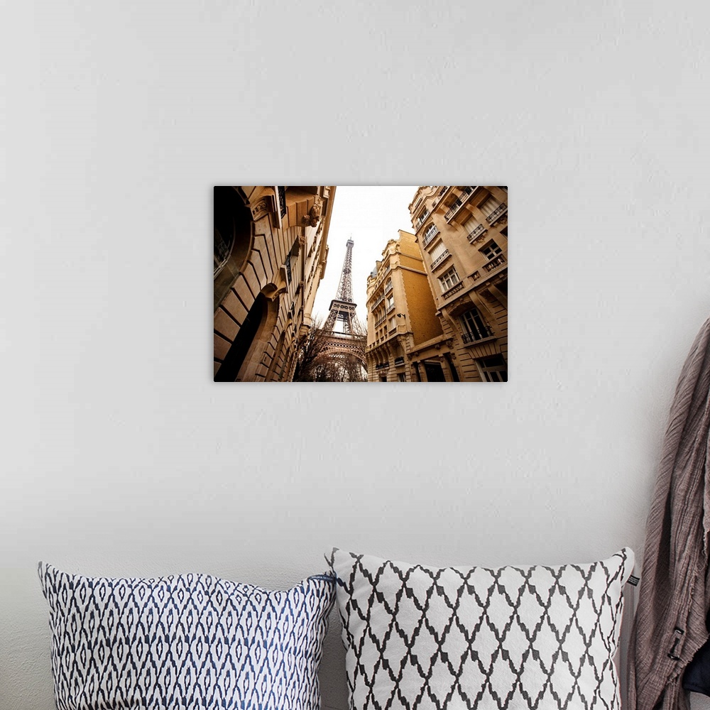 A bohemian room featuring Eiffel Tower and buildings.