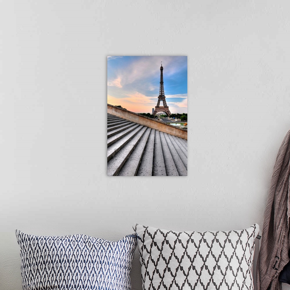 A bohemian room featuring Eiffel tower at sunrise, Paris, France.