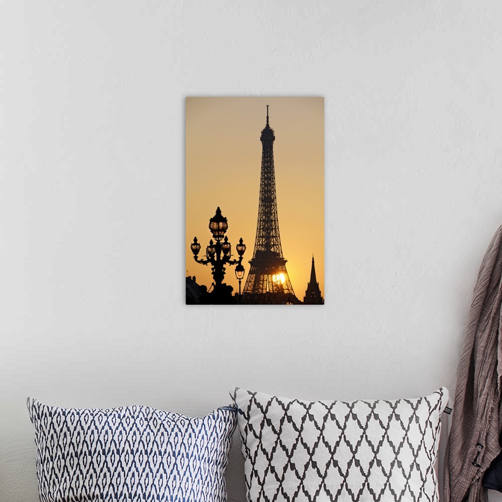 A bohemian room featuring Eiffel Tower at sunset