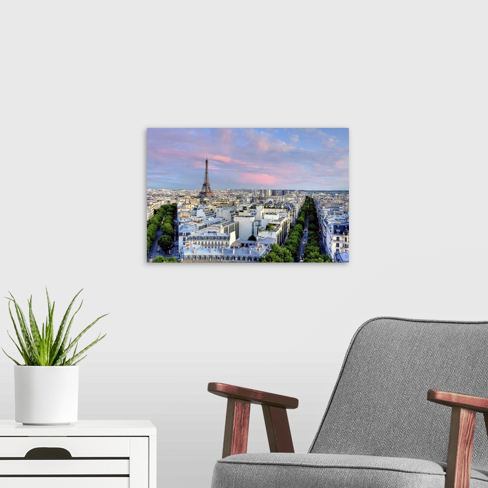 A modern room featuring Eiffel Tower at sunset, from Arc de Triomphe.