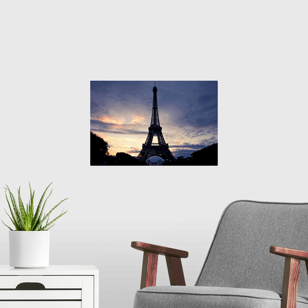 A modern room featuring Eiffel Tower at sunset, Paris, France