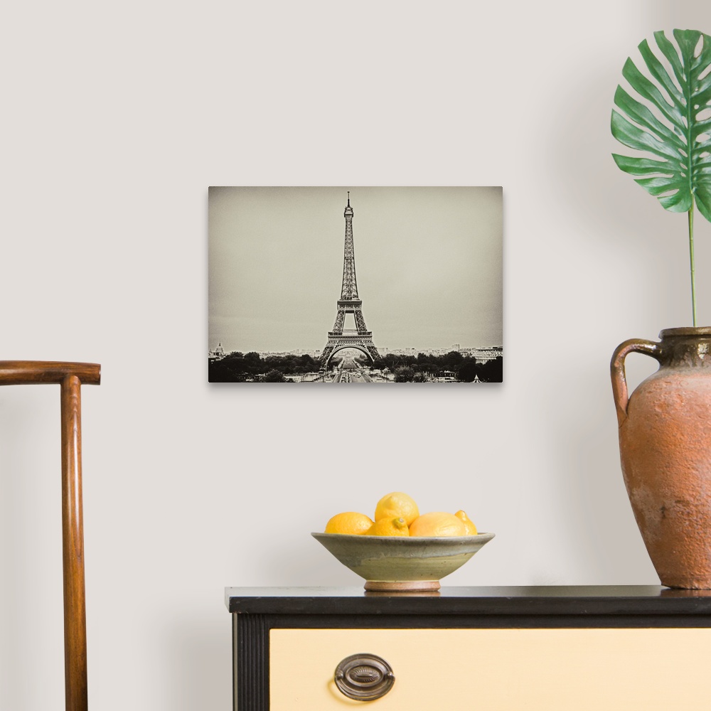 A traditional room featuring Eiffel Tower in old style black and white image.