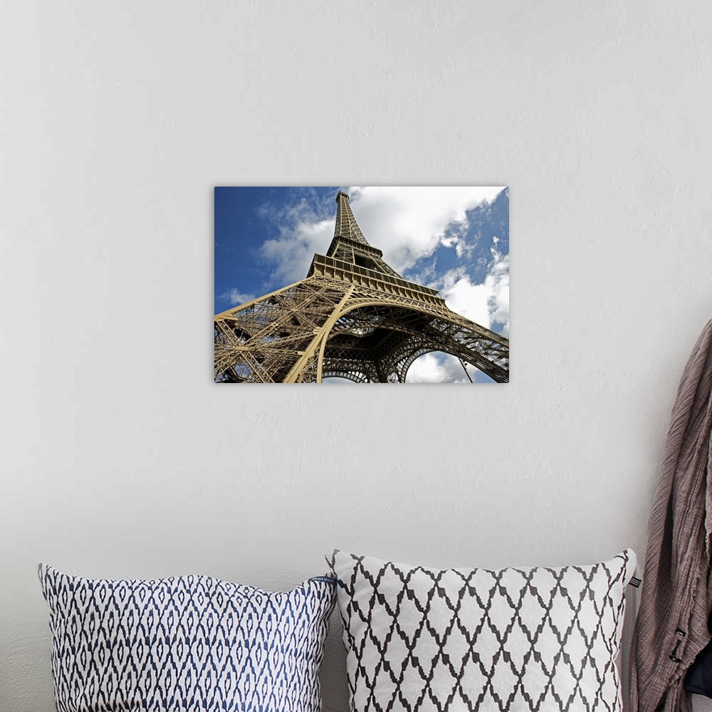 A bohemian room featuring Eiffel Tower on sunny day