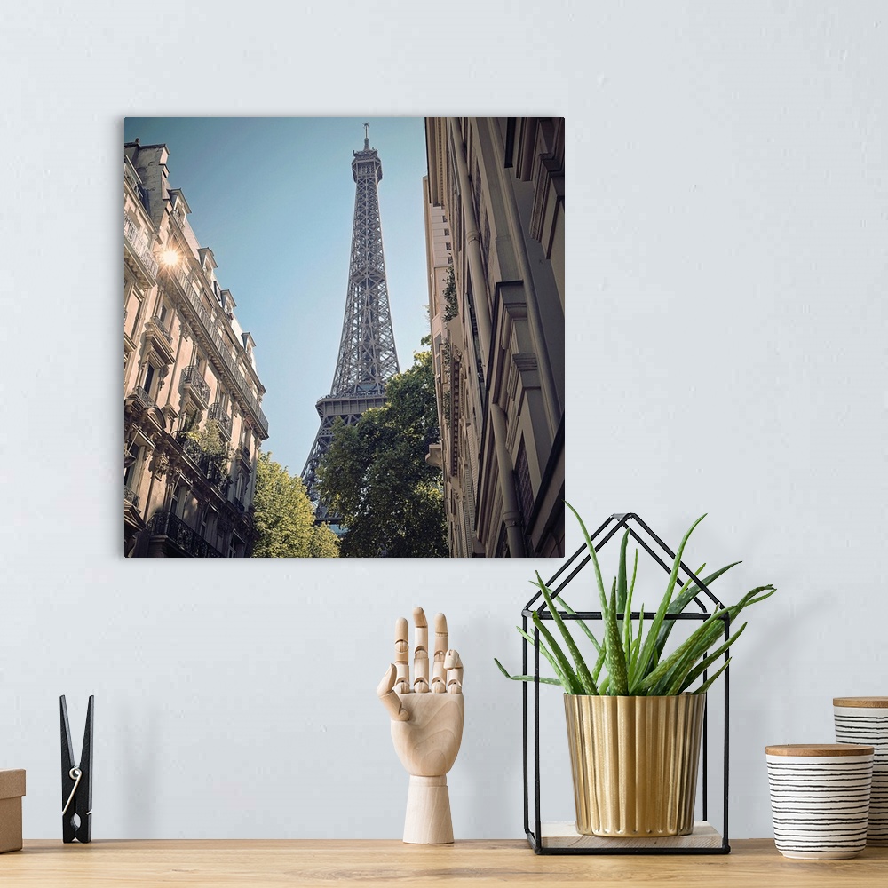 A bohemian room featuring Eiffel Tower taken from different angle.