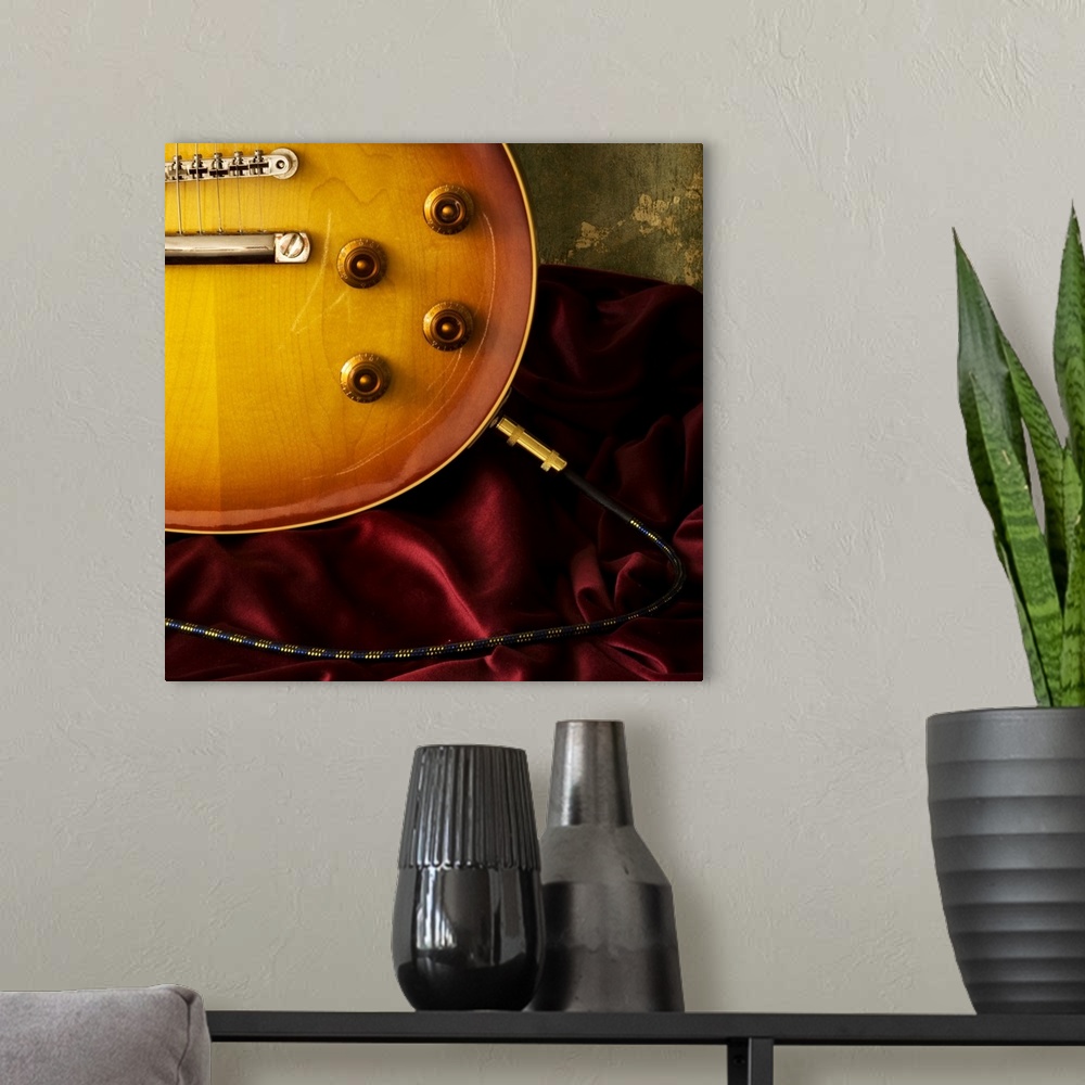 A modern room featuring Electric guitar