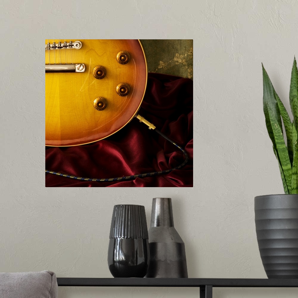 A modern room featuring Electric guitar