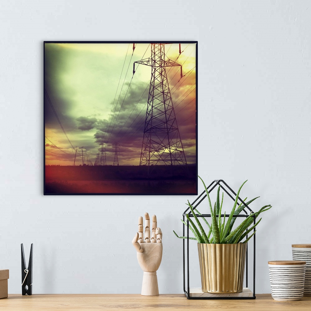 A bohemian room featuring Electricity pylons against cloudy sky in Woodland, California, US.
