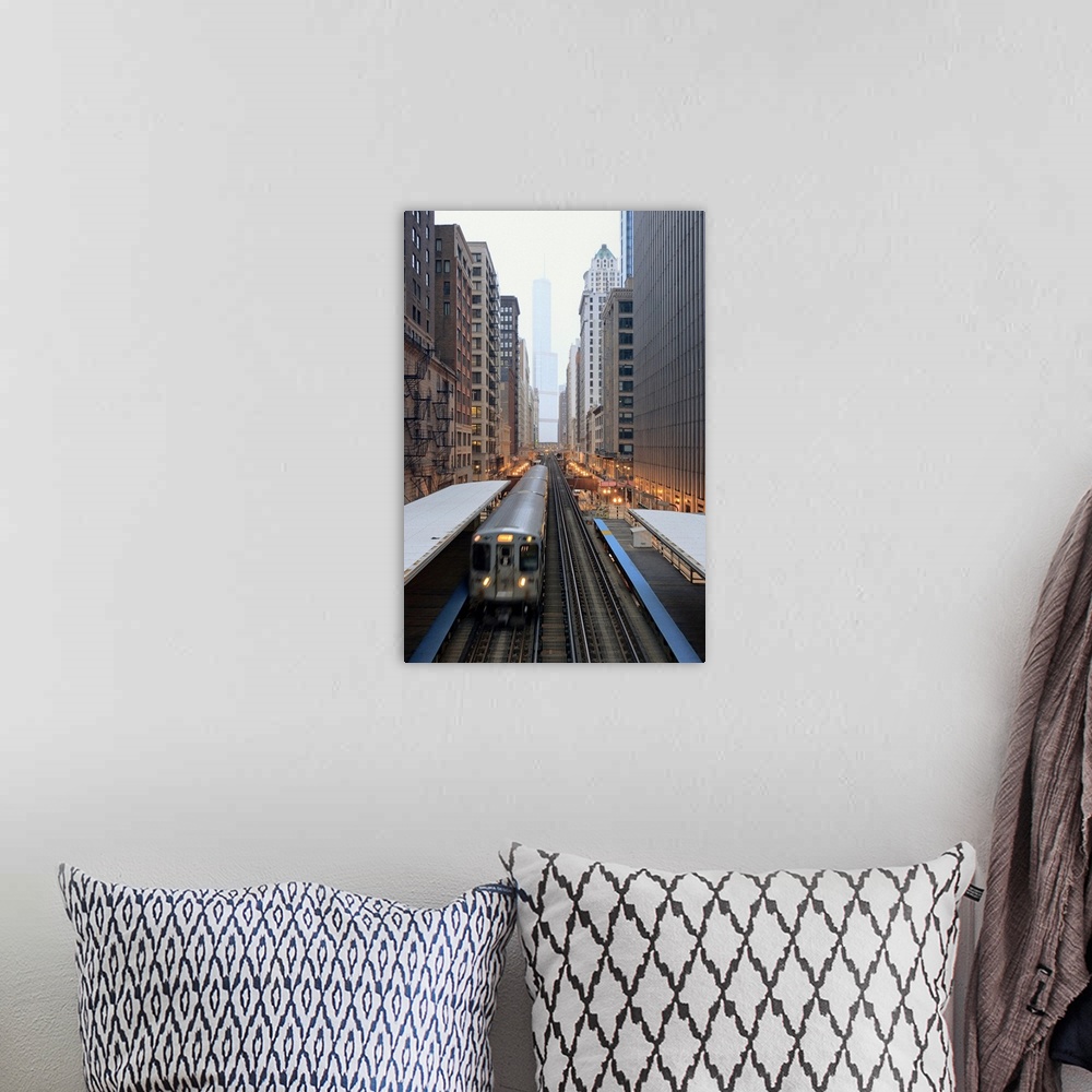 A bohemian room featuring Vertical panoramic photograph of railway lined with tall buildings and skyscrapers.