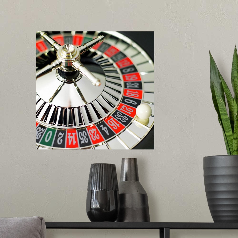 A modern room featuring Elevated view of roulette wheel