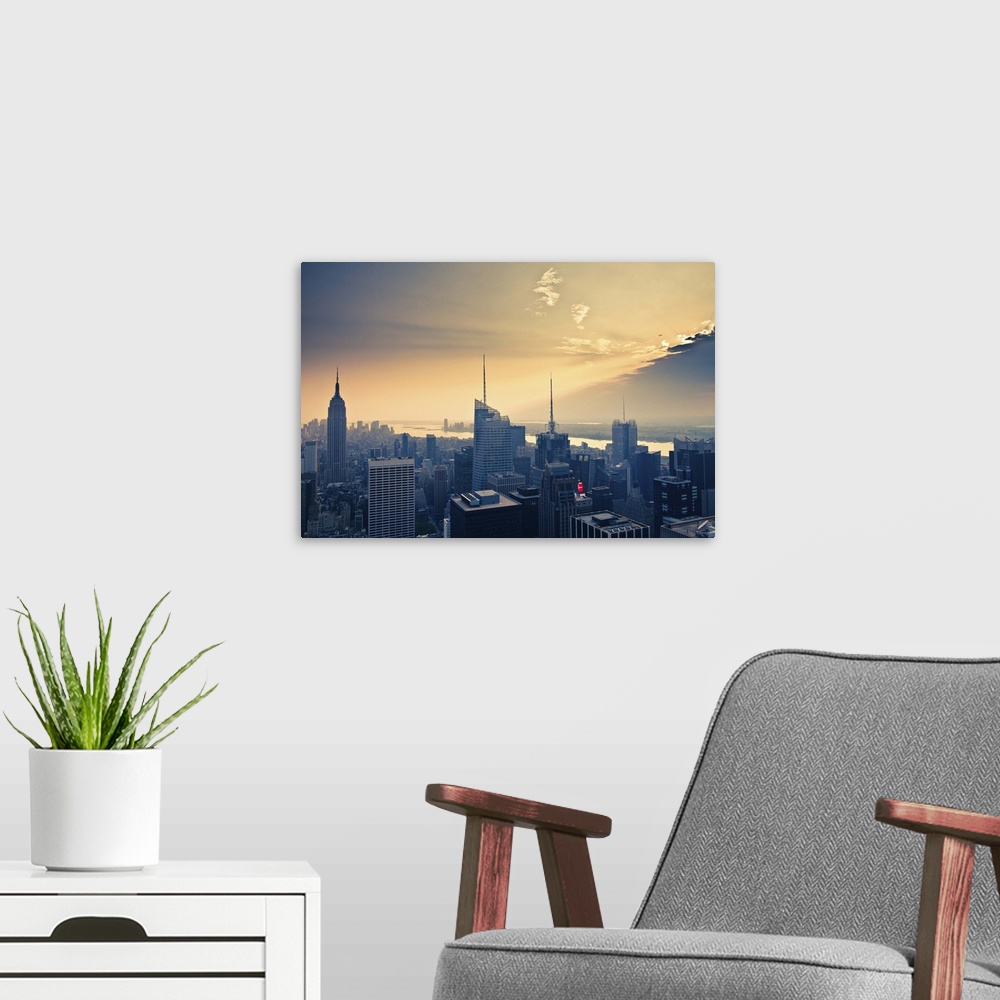 A modern room featuring Empire State Building and airplane flying into clouds.