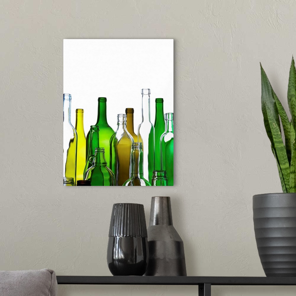 A modern room featuring Empty glass bottles on white background