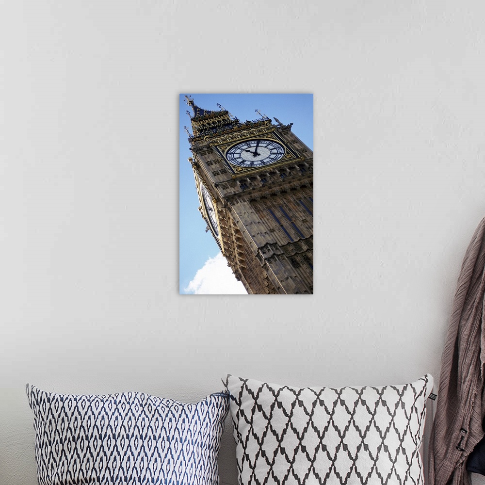 A bohemian room featuring Big Ben is photographed from below showing mostly the top of the structure at an angle.