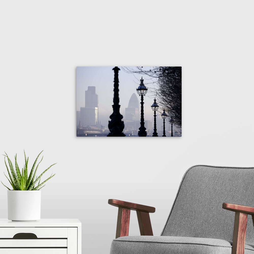 A modern room featuring England, London, lampposts by River Thames