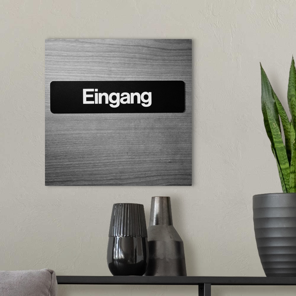 A modern room featuring Entrance Sign