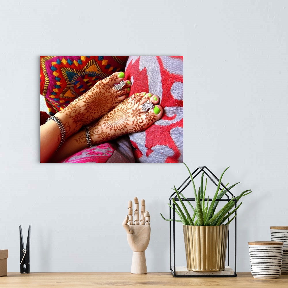 A bohemian room featuring Exotic henna patterned feet
