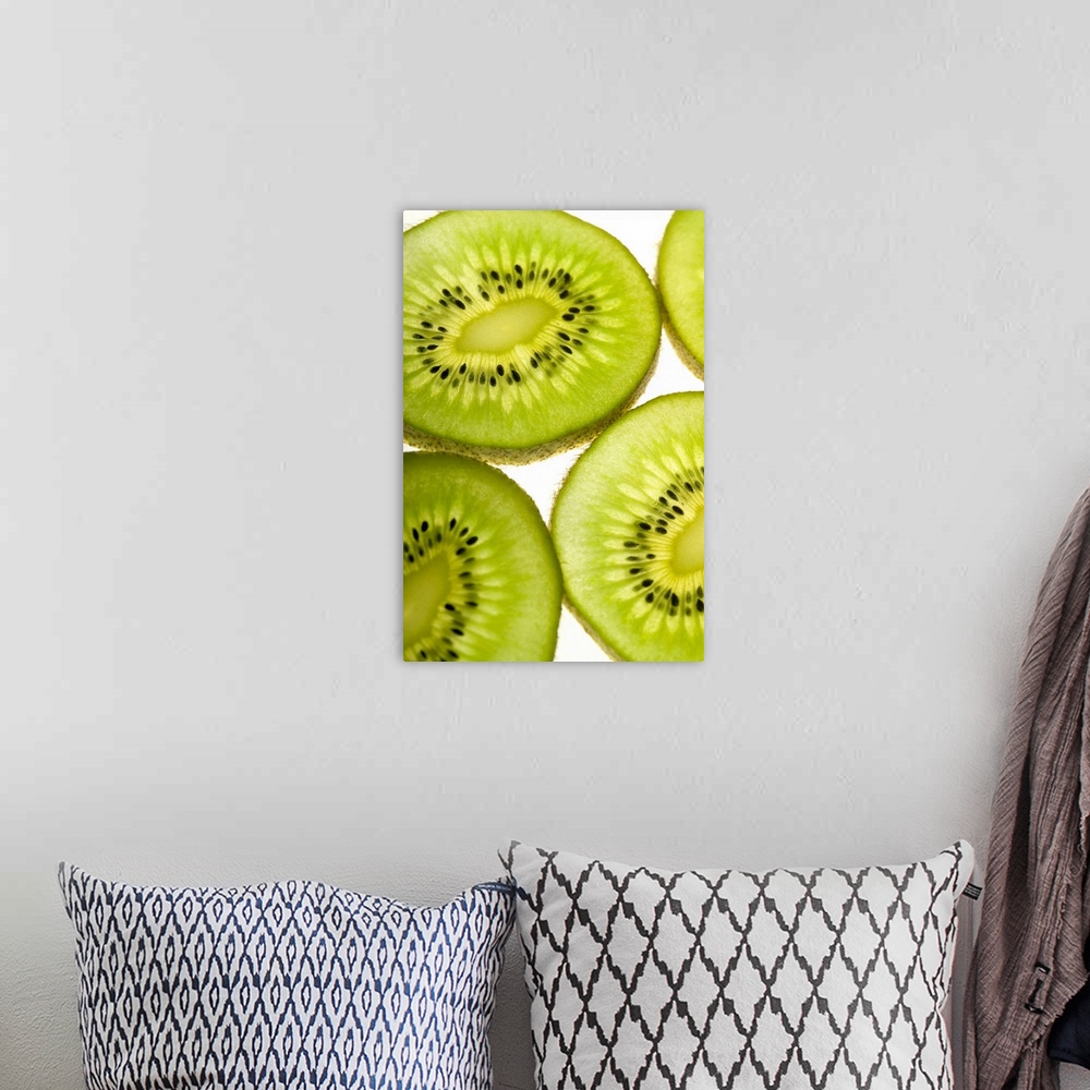 A bohemian room featuring Extreme close-up of four pieces of sliced kiwi fruit, part of