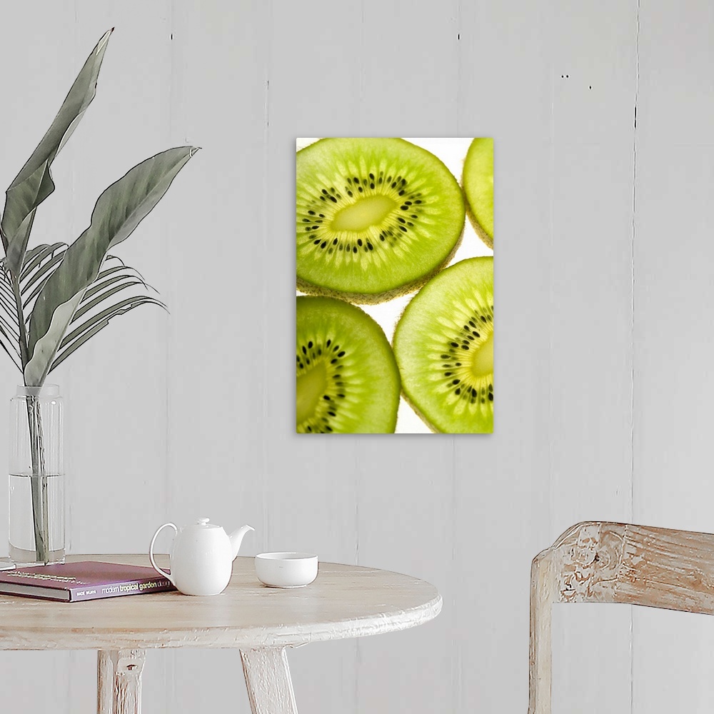 A farmhouse room featuring Extreme close-up of four pieces of sliced kiwi fruit, part of
